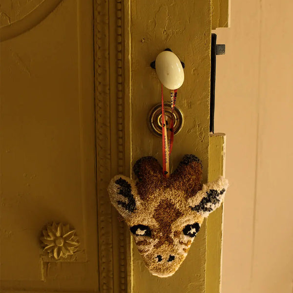 Doing Goods hanger giraffe