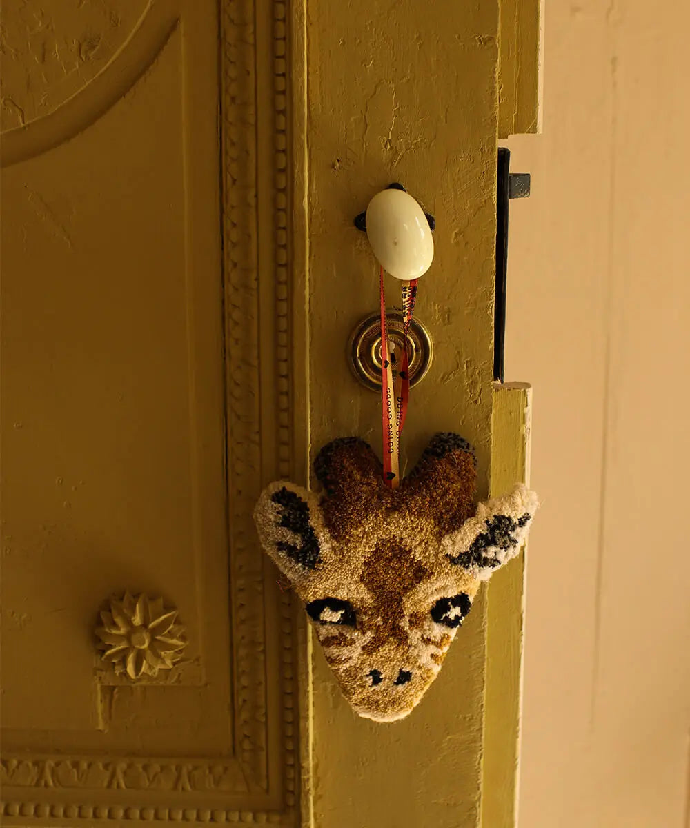 Doing Goods hanger giraffe